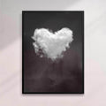 Framed artwork of a heart-shaped cloud on a dark background - black frame