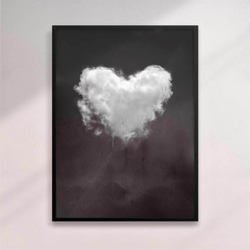 Framed artwork of a heart-shaped cloud on a dark background - black frame