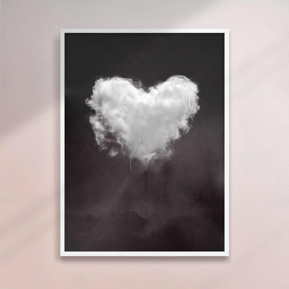 Heart-shaped cloud art print on a black background with a white frame.