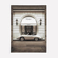 Luxury fashion poster featuring a vintage Porsche parked outside a Cartier store