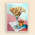 Framed artwork of French fries in a martini glass on a colorful background