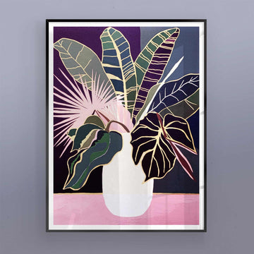 Framed artwork of a vase with colorful leaves on a gray wall