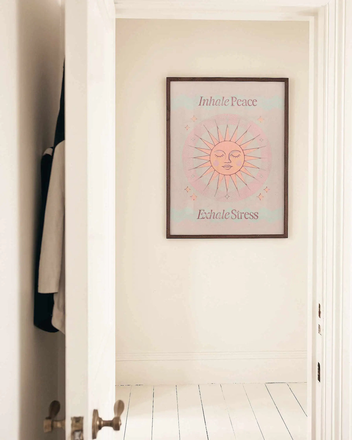 Calming Inhale Peace, Exhale Stress quote wall art styled in a modern neutral interior with minimalist and Japandi-inspired décor.