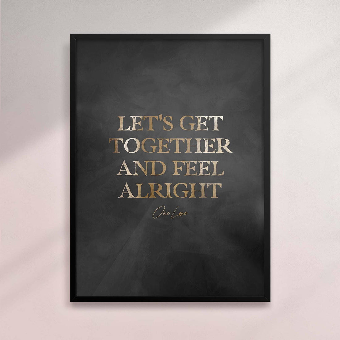 Framed artwork with gold text on a dark background - Black frame