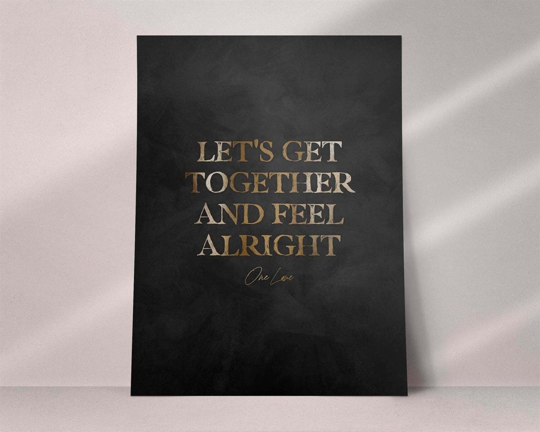 Framed artwork with gold text on a dark background - Black frame