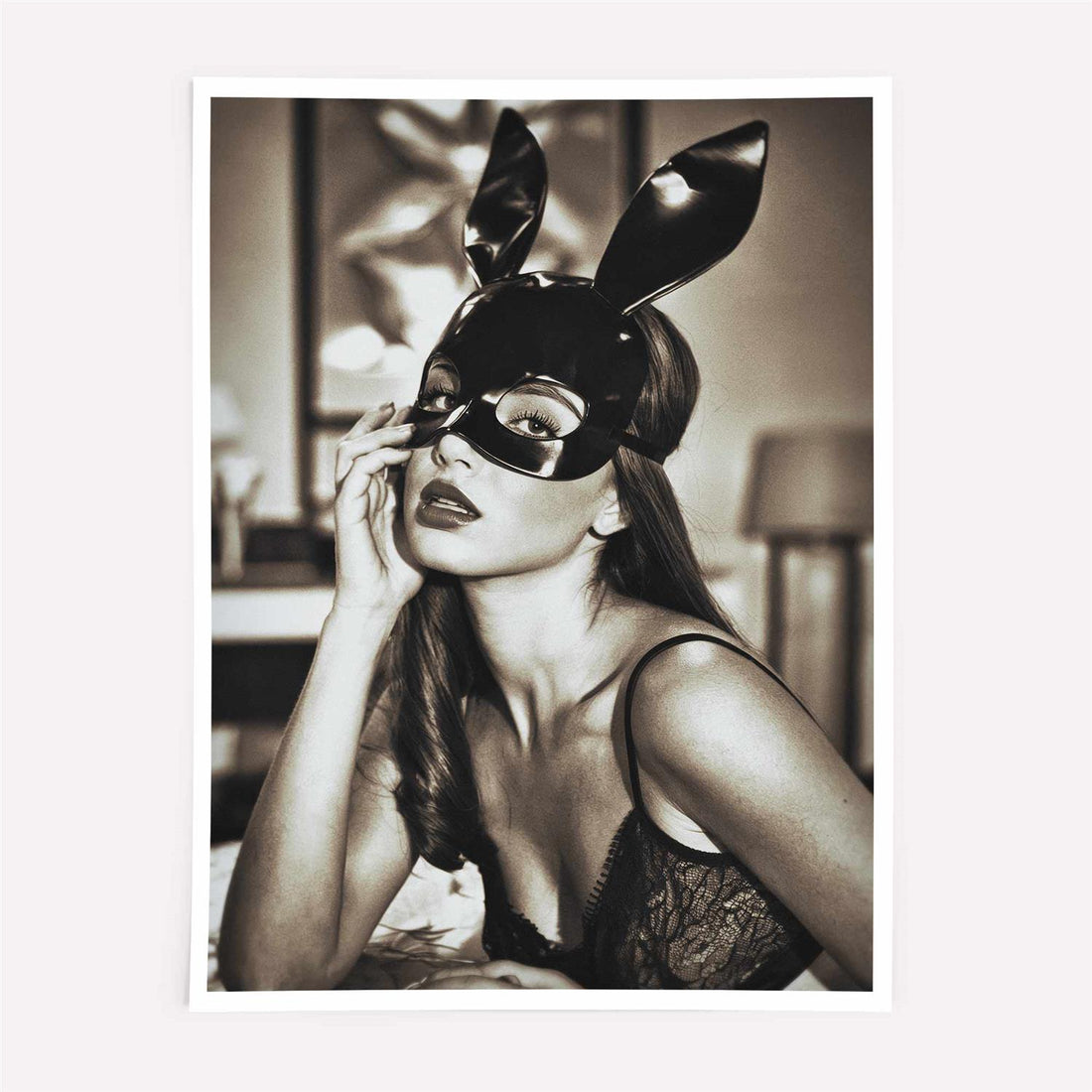 Framed black and white art print of a woman wearing a mask with bunny ears.