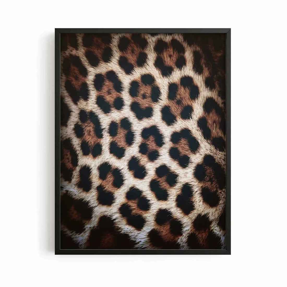 Leopard black framed fashion wall art displayed in a luxury bedroom | After Hours Gallery