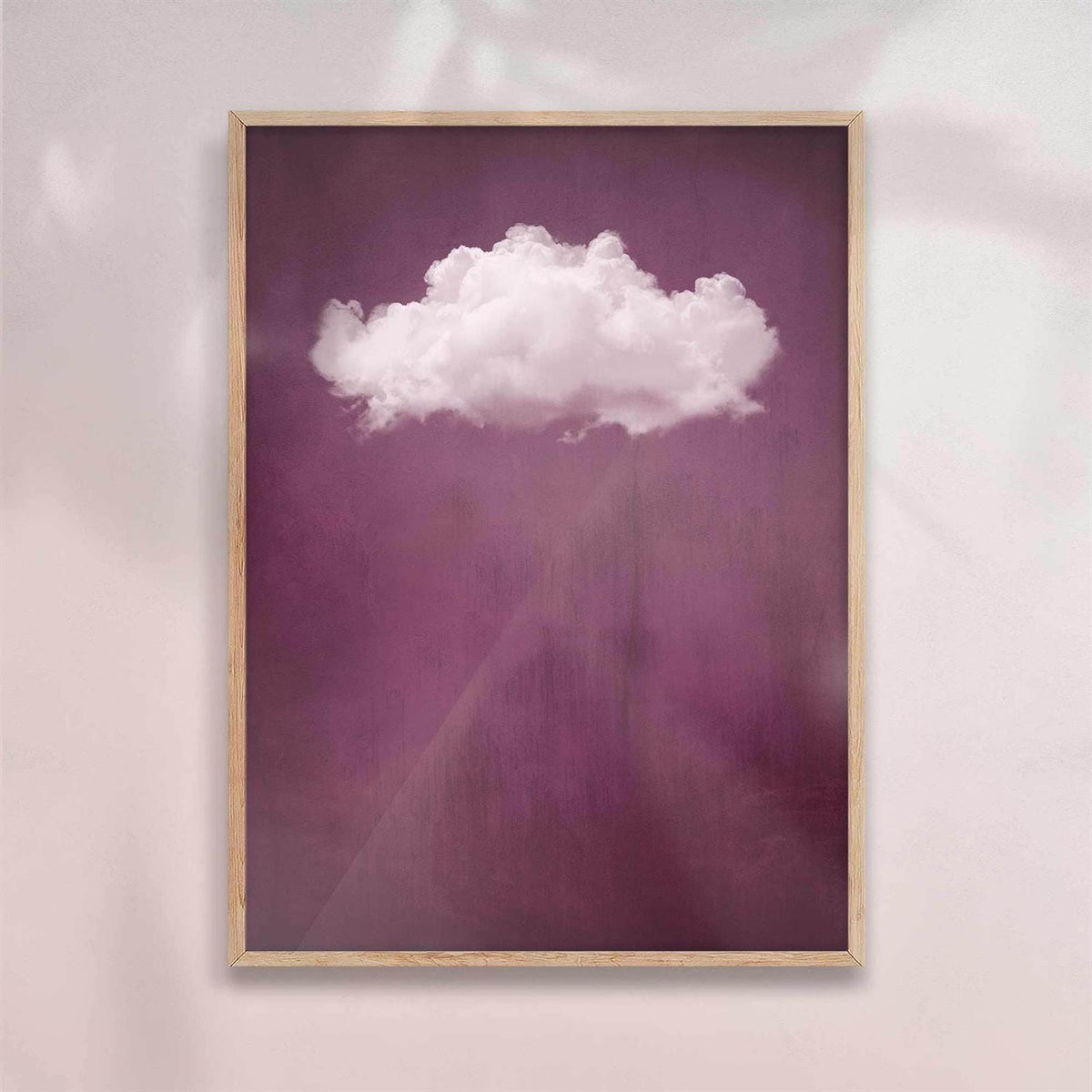 Framed artwork of a white cloud on a purple background natural/oak frame