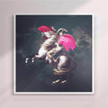 Framed artwork of a person riding a rearing horse with pink accents on a dark background - white frame